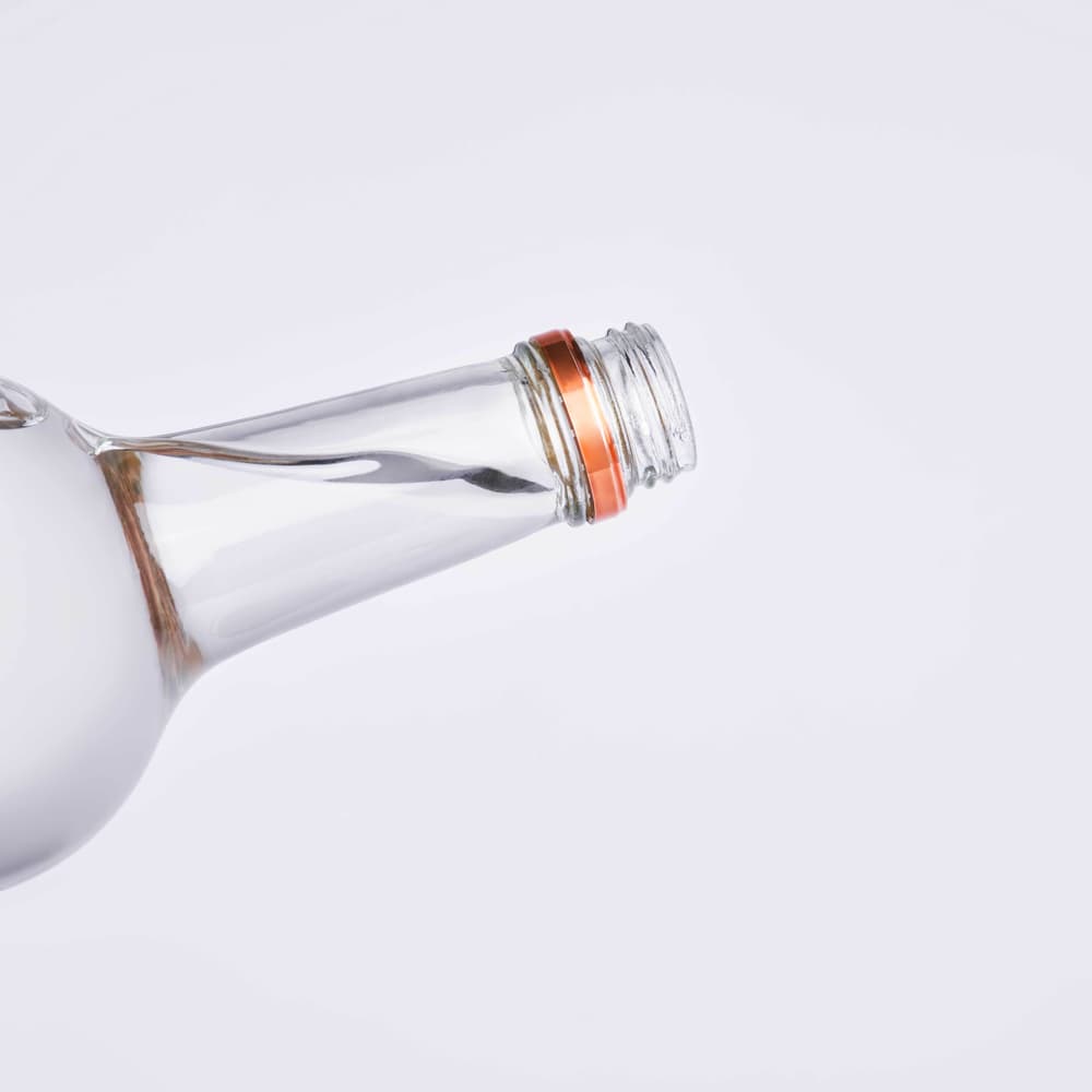 Tito's Vodka bottle being poured