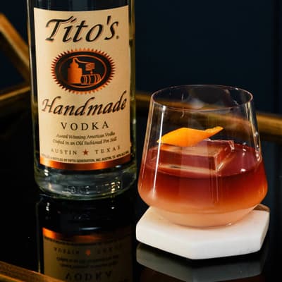 Tito's Spiced Wine Sipper garnished with an orange peel