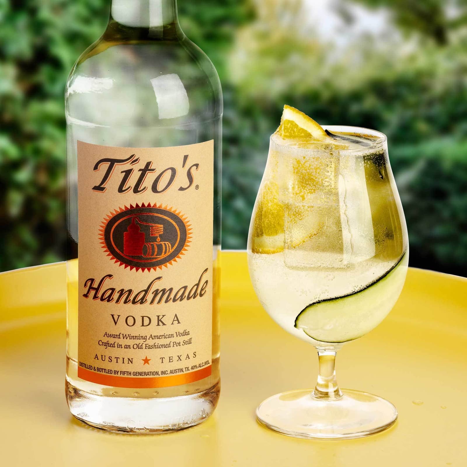 Tito's Summer Breeze garnished with orange and cucumber
