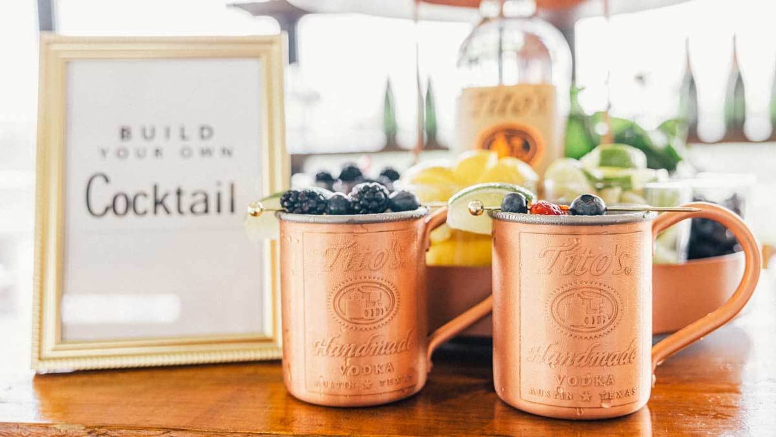 Tito's Copper Mugs with assorted garnishes