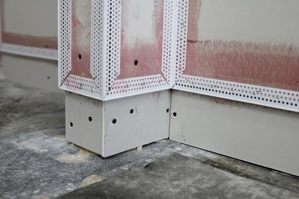 After the drywall is applied to the beams, install Trim-Tex vinyl beads with 847 Spray Adhesive. After the drywall is applied to the beams, install Trim-Tex vinyl beads with 847 Spray Adhesive.