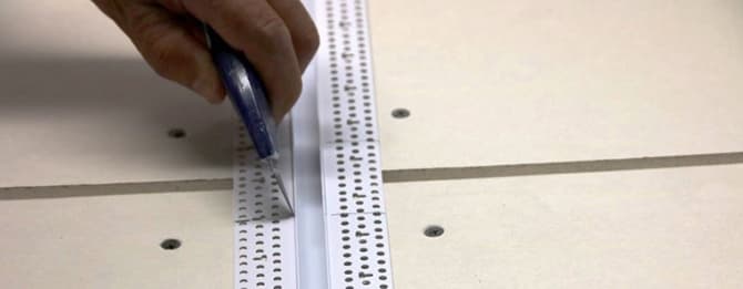 Using a utility knife, cut along the mud bump on each side of the Architectural Reveal Bead.