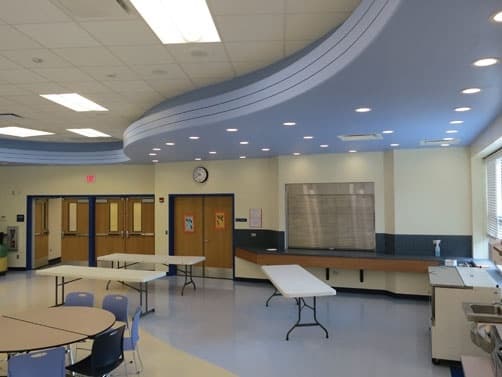 Architectural Reveals were incorporated into Oak Grove Elementary school to build curved soffits with a racing stripe reveal design.