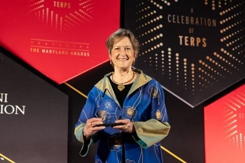 Dr Jody Olsen with award