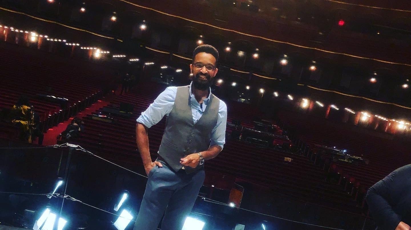 UMD Graduate Jarrod Lee on the stage of the Metropolitan Opera