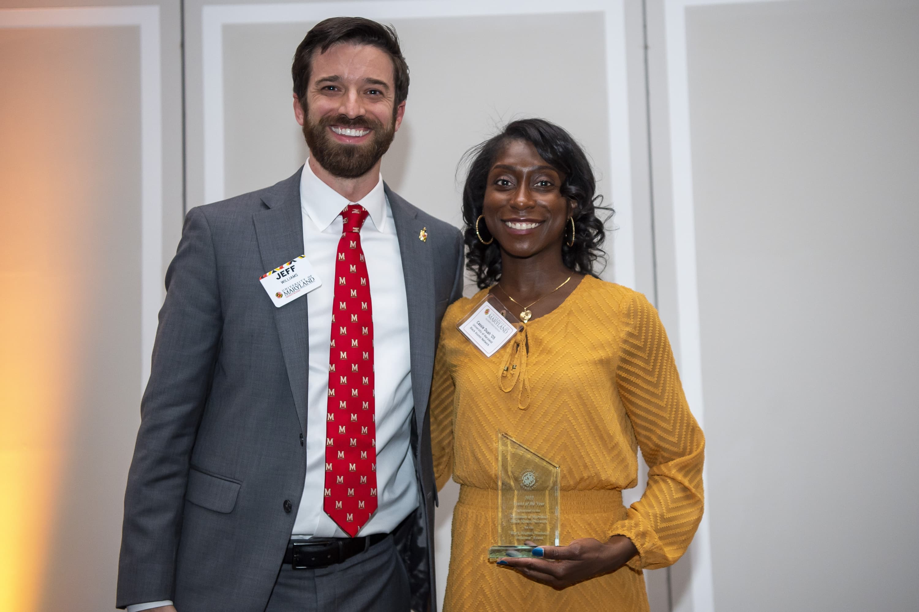 The Alumni Association's Jeff Williams stands along with UMBA's Cassie Duah at the Volunteer Leadership Awards