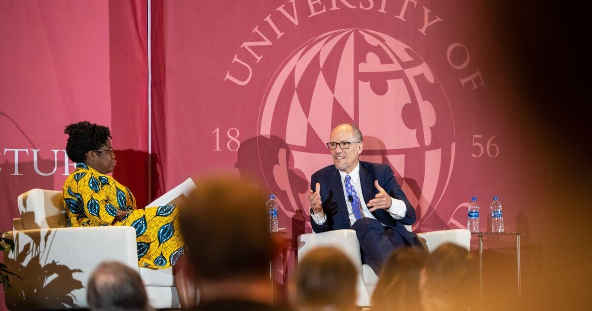 Tom Perex, former U.S. Secretary of Labor and former Chair of the Democratic National Committee, faces UMD Assistant Professor Chryl Laird, Department of Government and Politics, on a stage in front of a crowd.