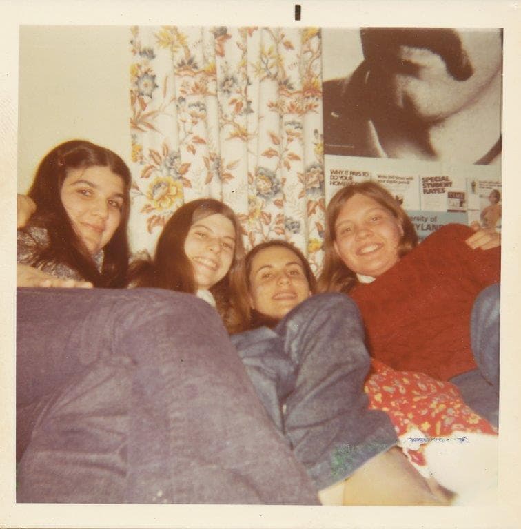 Group of four female students together in a dorm in 1972