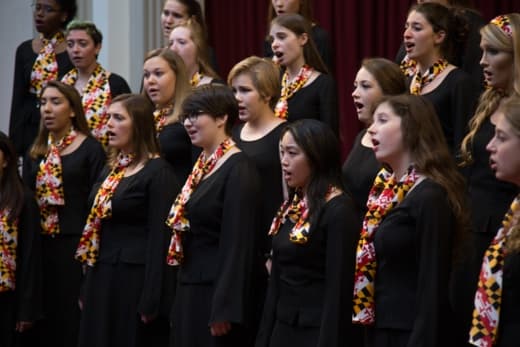 Choir performs.