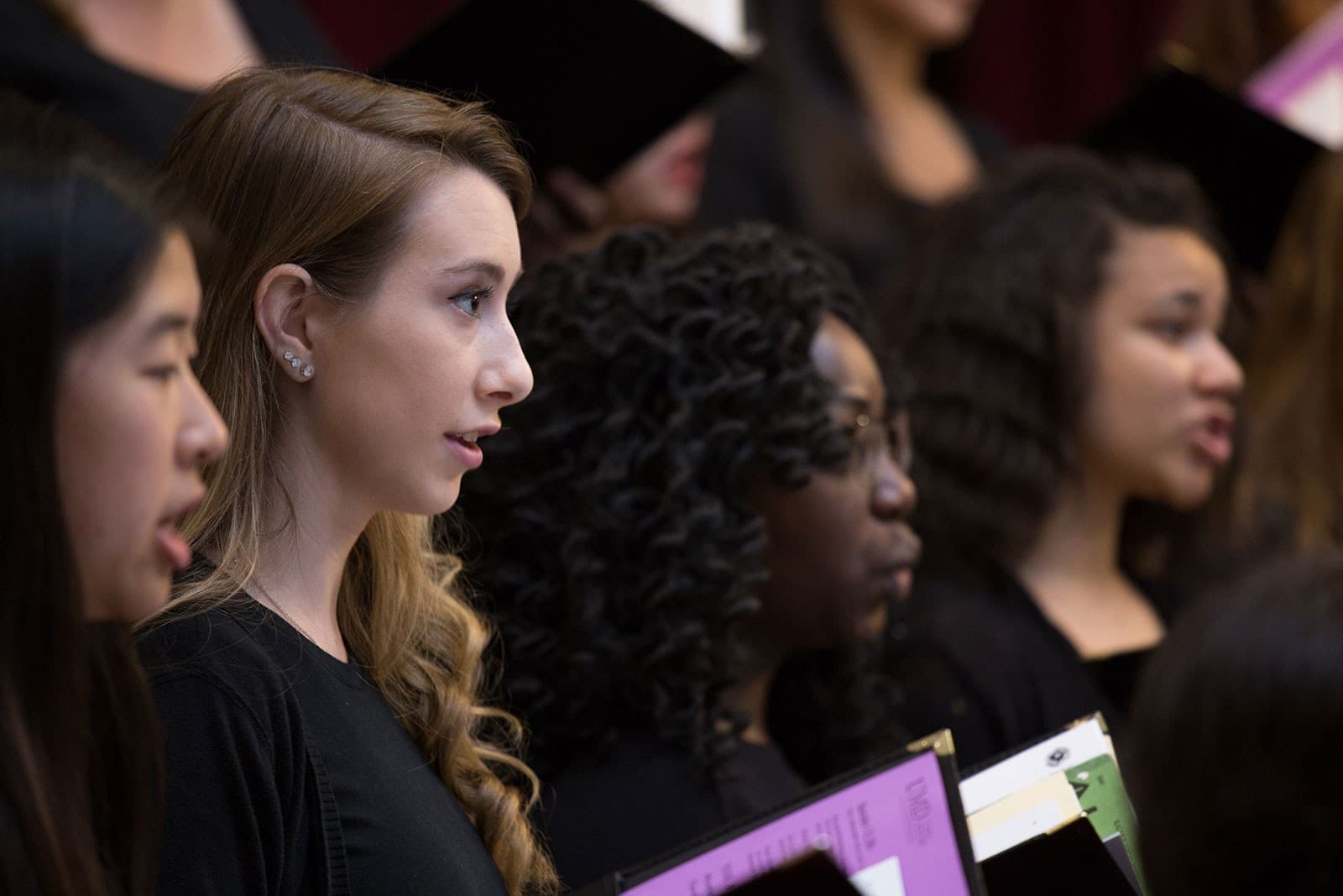 Choir students mid-performance.