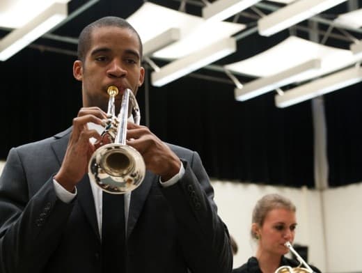 Student plays trumpet.