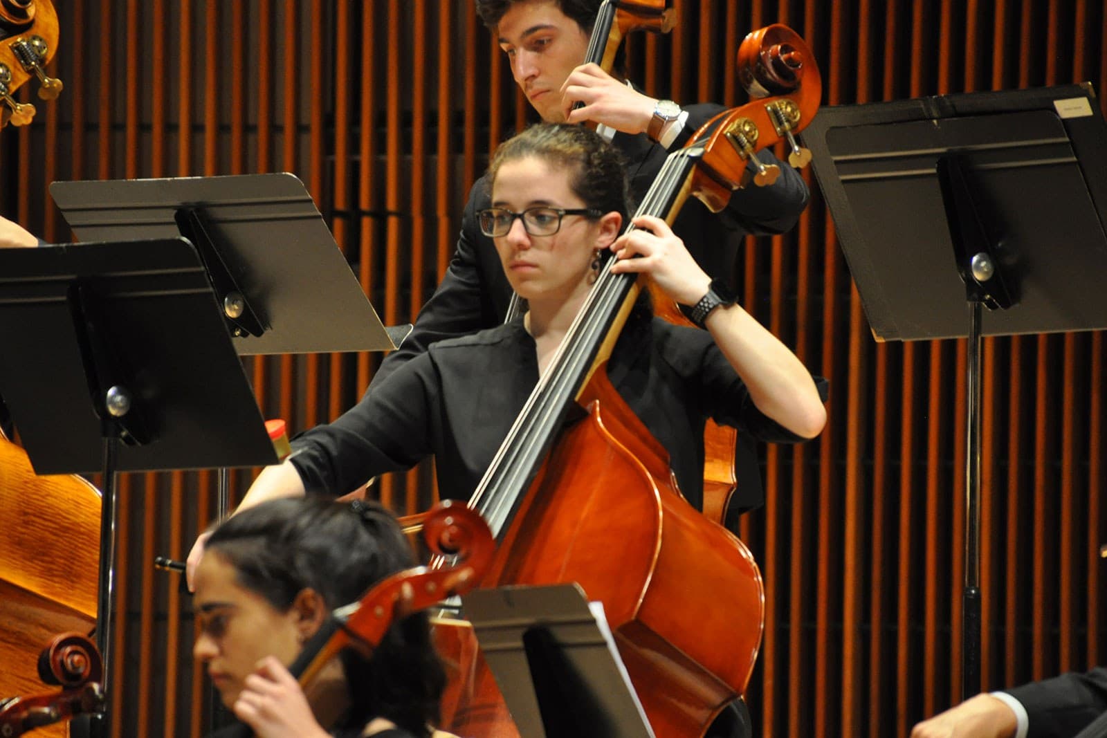 A female student plays bass.