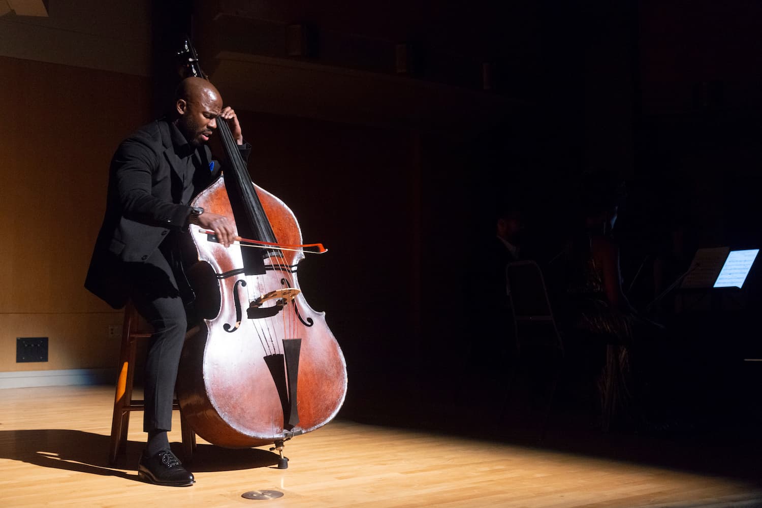 A man plays cello.