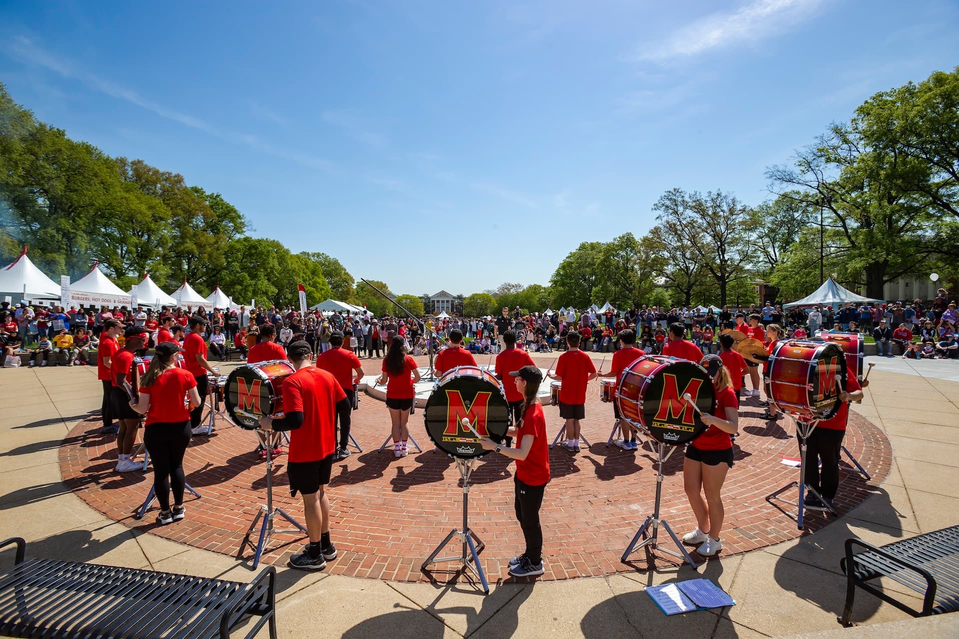 Crowd gathers on Maryland Day to watch the University of Maryland rumline perform.