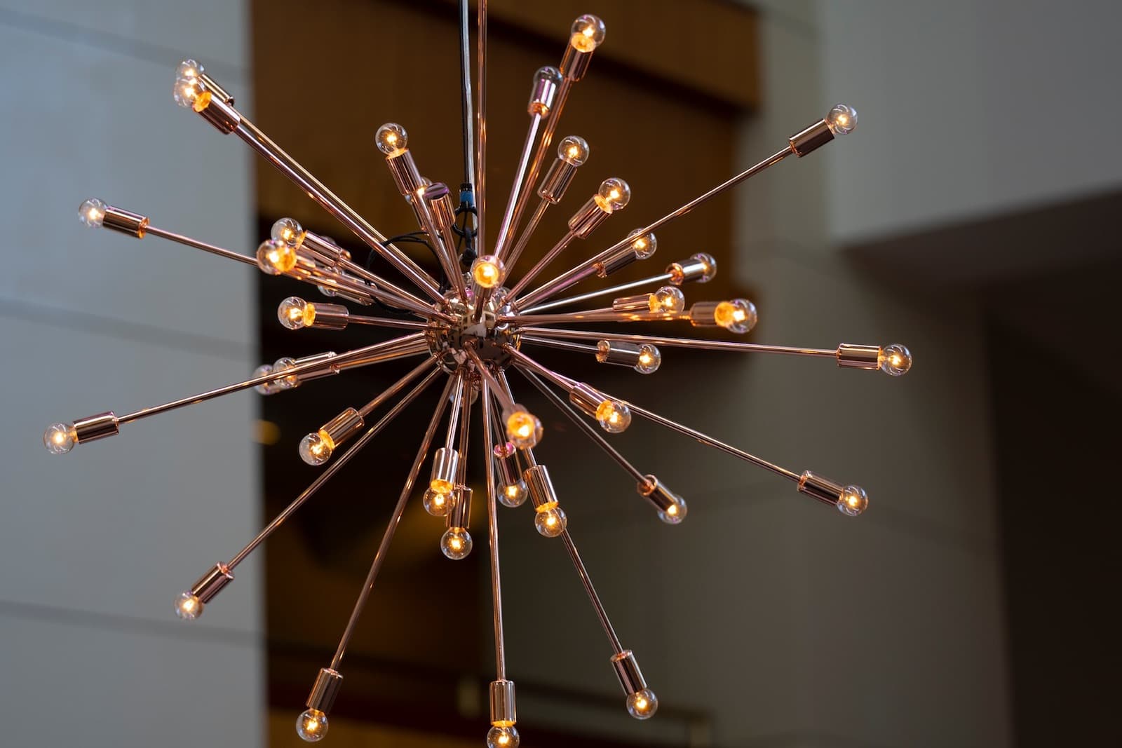 A hanging light shaped like a firework.