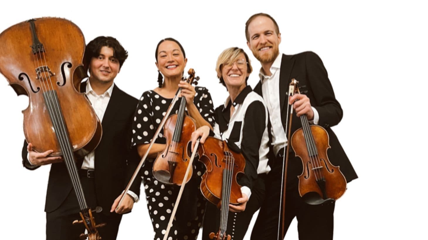 The four members of the Thalea String Quartet pose for a picture with their string instruments.