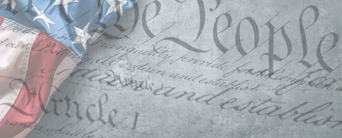 photo of the constitution overlaid with an american flag