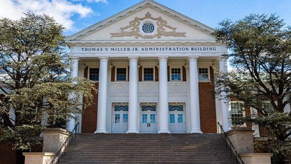 View of Miller Main Administration Building with the flags at half mast in honor of Maryland Senate President Emeritus Thomas V. Mike Miller.