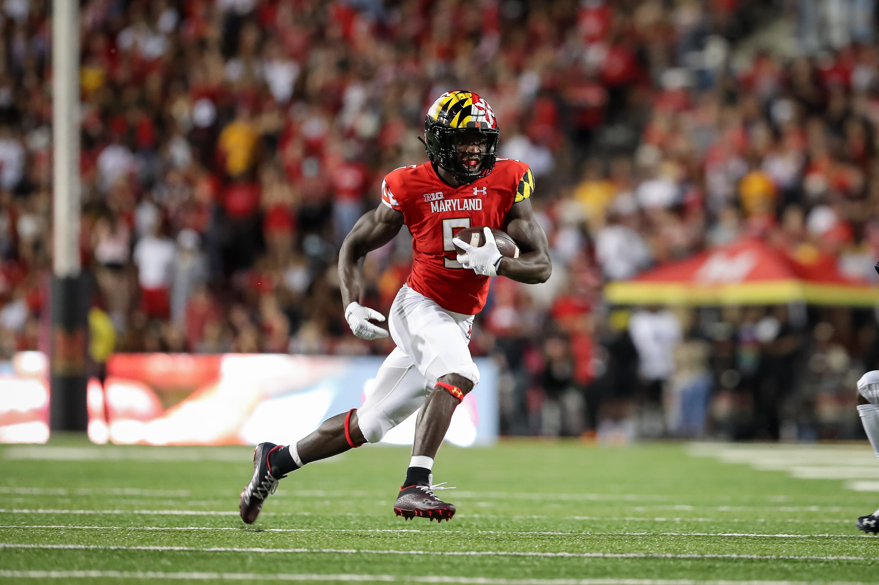 Football player on the field of Maryland Stadium