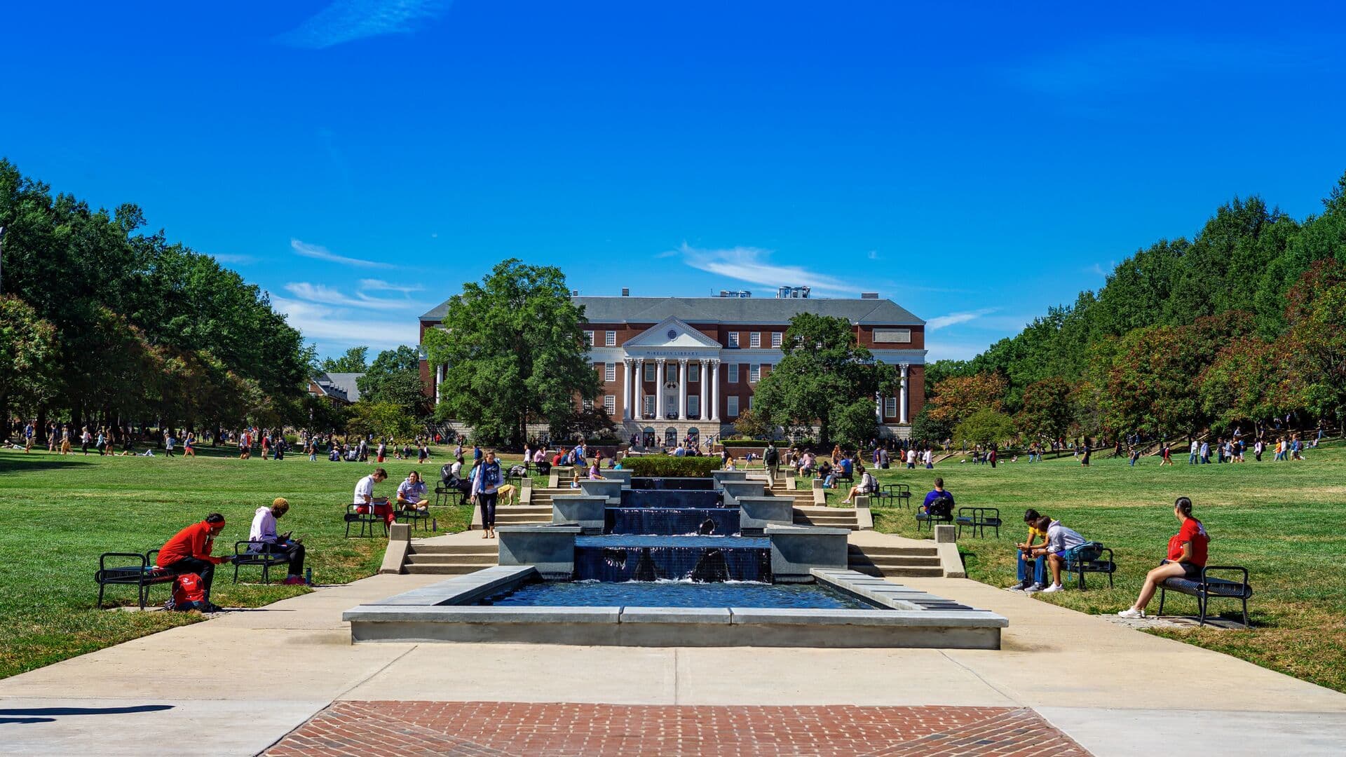 Students on the Mall looking towards ODK Fountain and McKeldin Library.