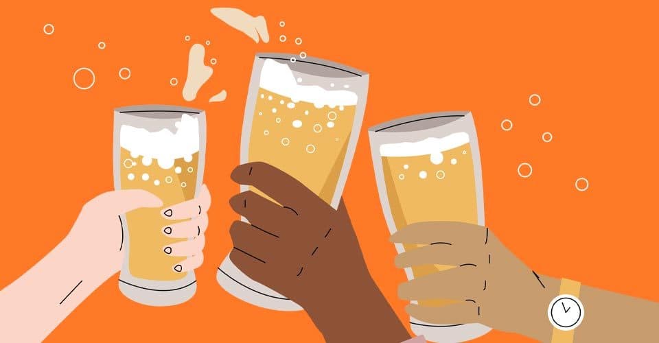 Three hands raise beer glasses for toast