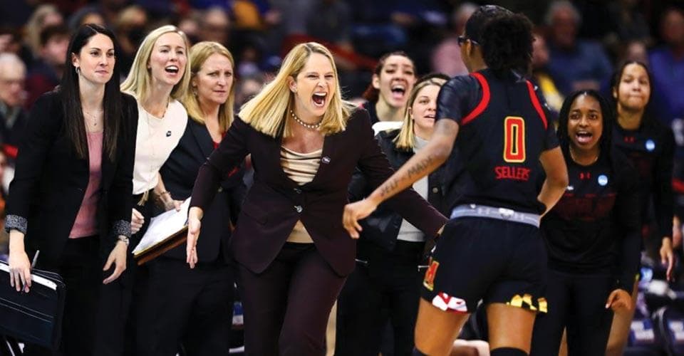 Maryland women's basketball coach Brenda Frese celebrates with team