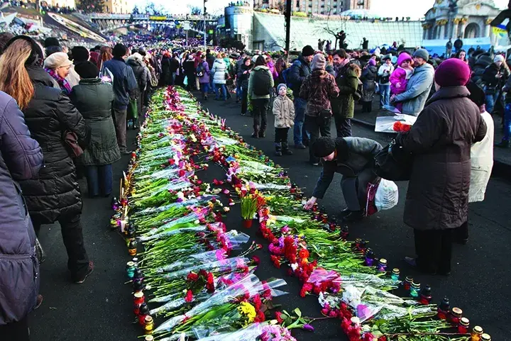 Unrest in Ukraine was one of the more recent events reported by Nelson. Photo by AP Images.
