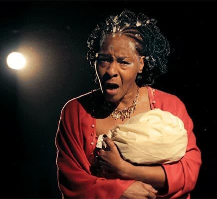 angry mother holds baby