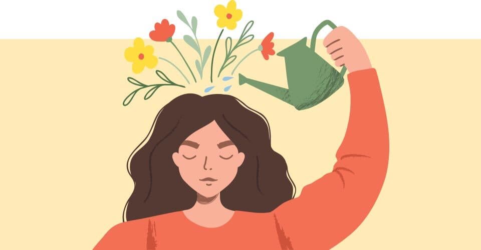 woman waters flowers on head