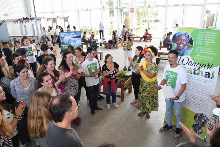 Exhibition held in the lobby with a crowd of people gathered.
