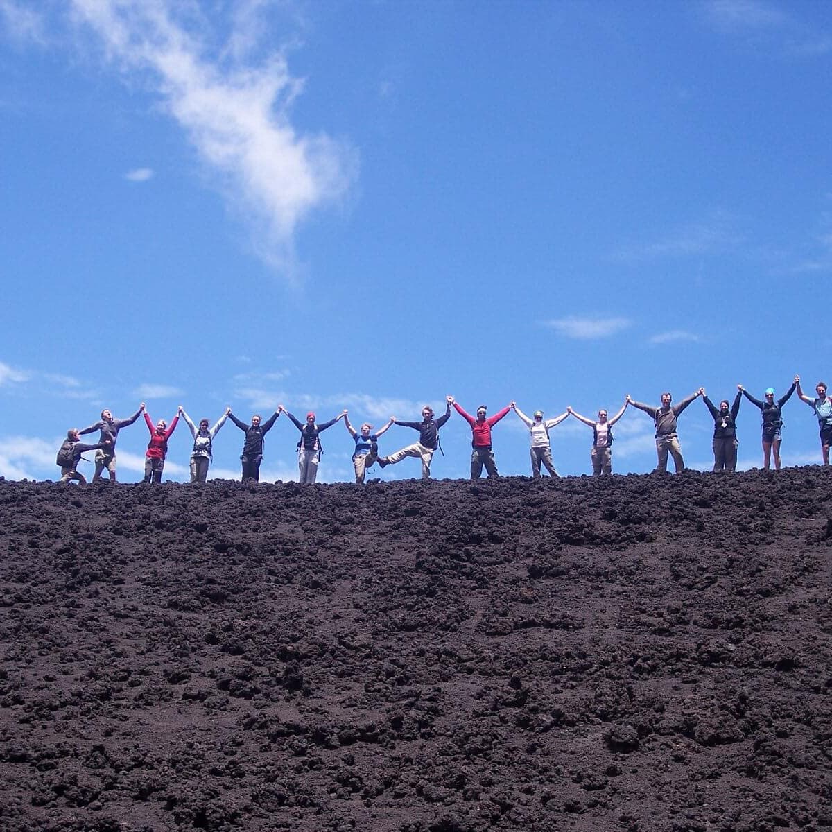 Pacaya Volcano Custom Tour Group Jumps for the camera