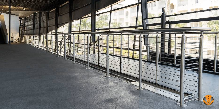 An image of a stainless steel railing system at a Publix.