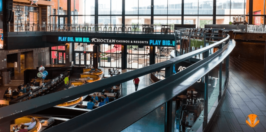 An image of a fully customized railing system overlooking the casino and event space.