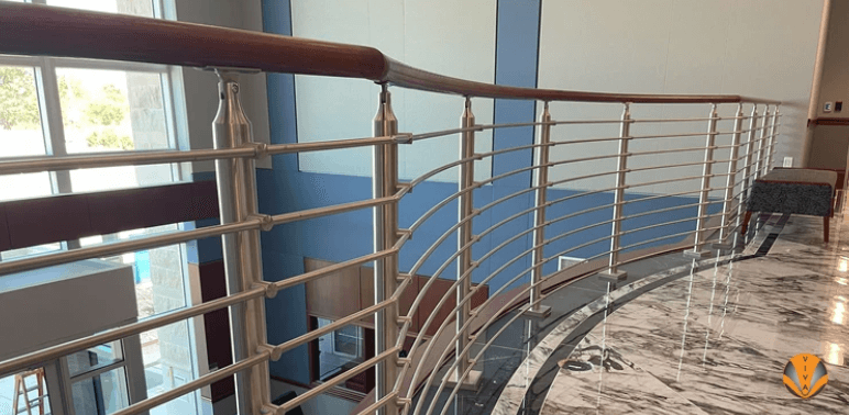 The Playa Vista Runway features dining, fitness, shops, urgent care, and a multi-colored SOLO™ Glass Railing System.