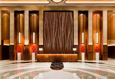 Fotofacade lasercut dot pattern hotel lobby trees 1