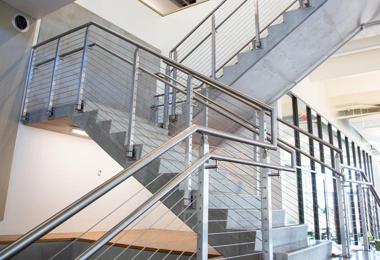 Curved Frameless Glass Railing | Southwest Adventist… | VIVA Railings