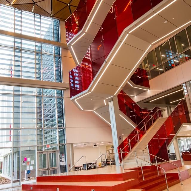 Red Temp Railing VIVA Railings | Three shades of red glass create a dynamic visual…
