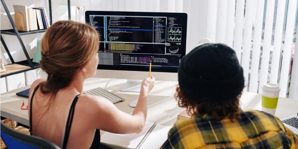 Students discussing programming code picture id1259138945