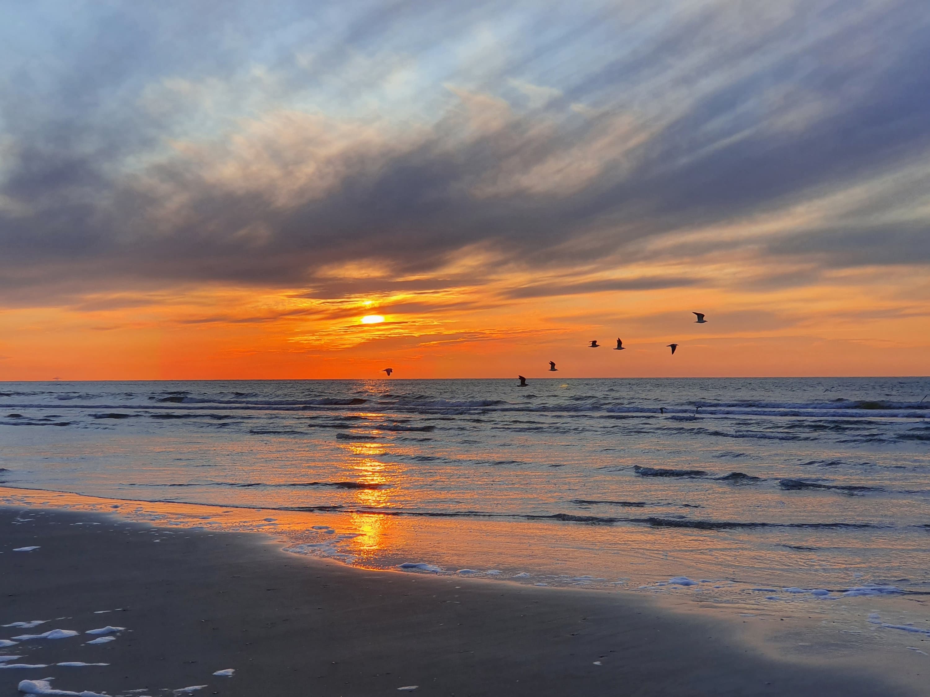 Zonsondergang strand