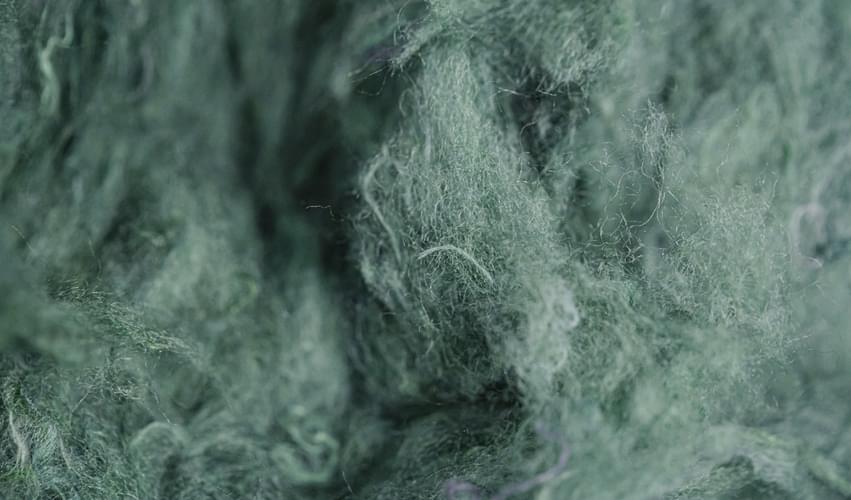 Recover™ recycled cotton fibers ready to be blended with a carrier fiber