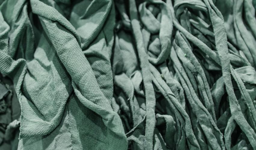 Textile Waste for our blended recycled fibers process. Textile waste comes from post-industrial or post-consumer origin. Color of the textile waste will determine the color of the final output, for recycled cotton fiber blends ready to be spun, no need for overdyeing.