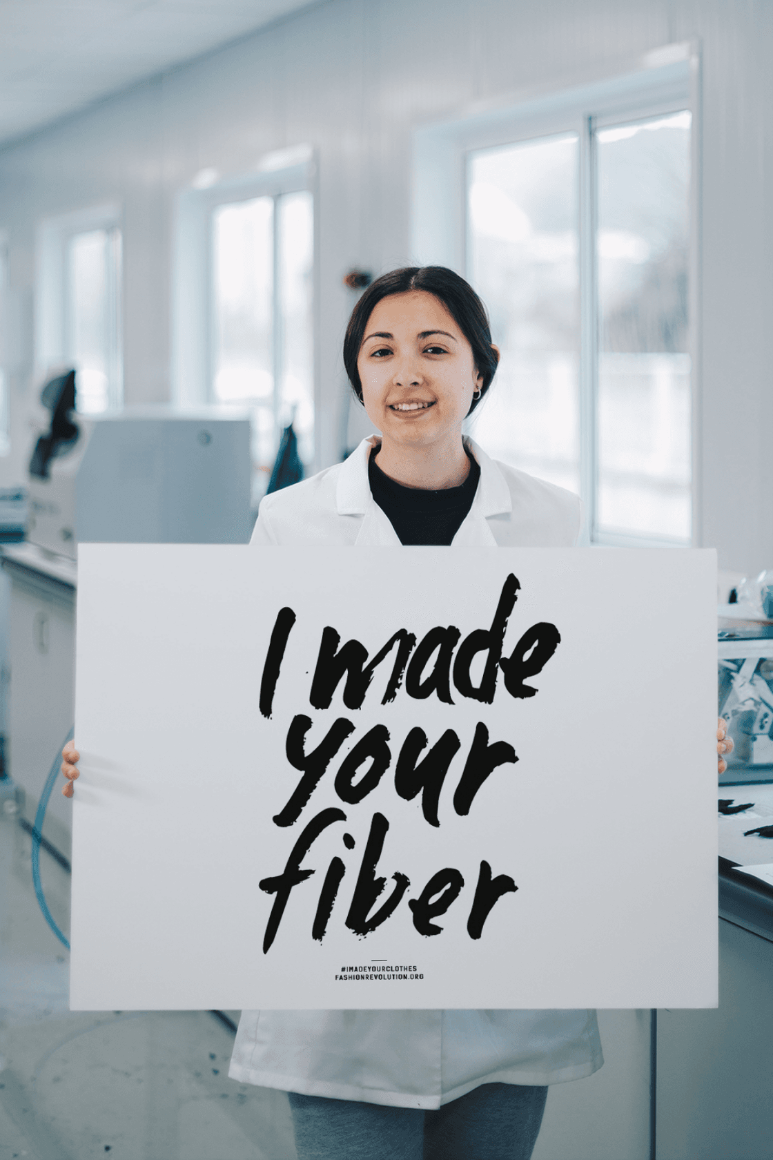 Recover employee in Spain with "I made your fiber" message for Fashion Revolution Week 2024