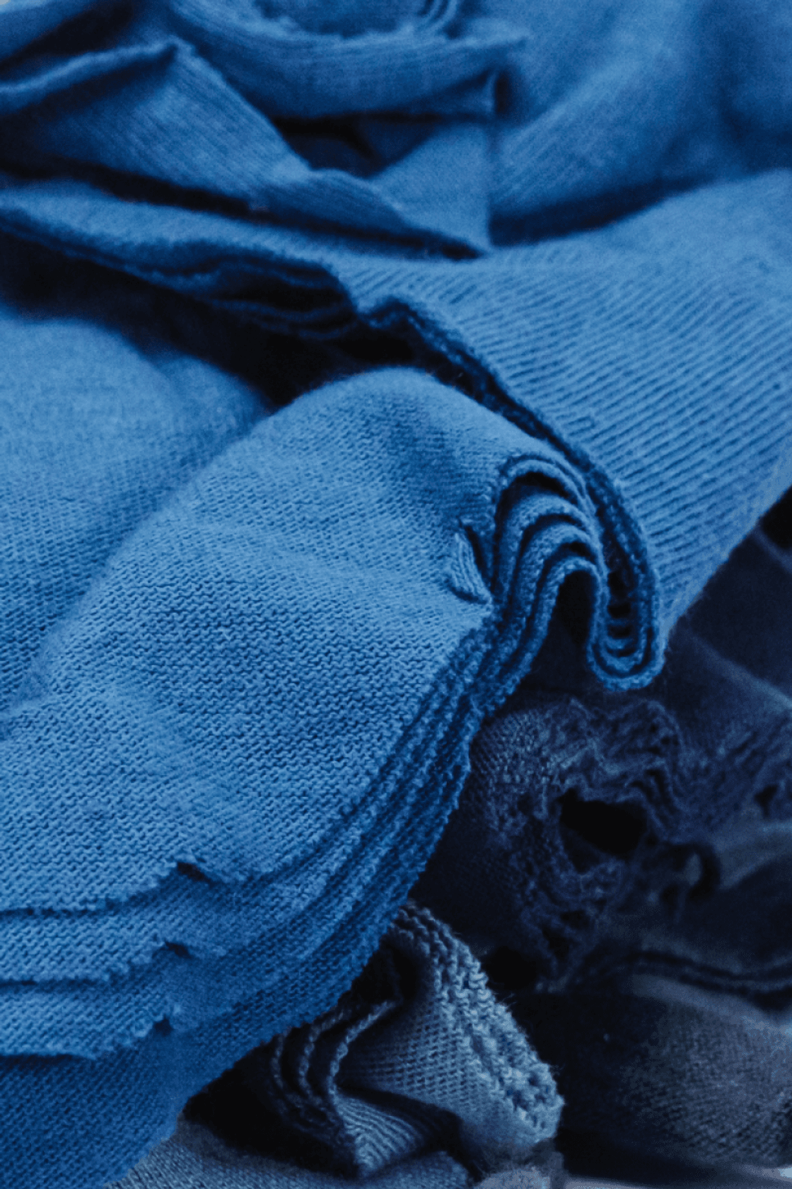 Close-up picture of textile scrap, our raw material at Recover