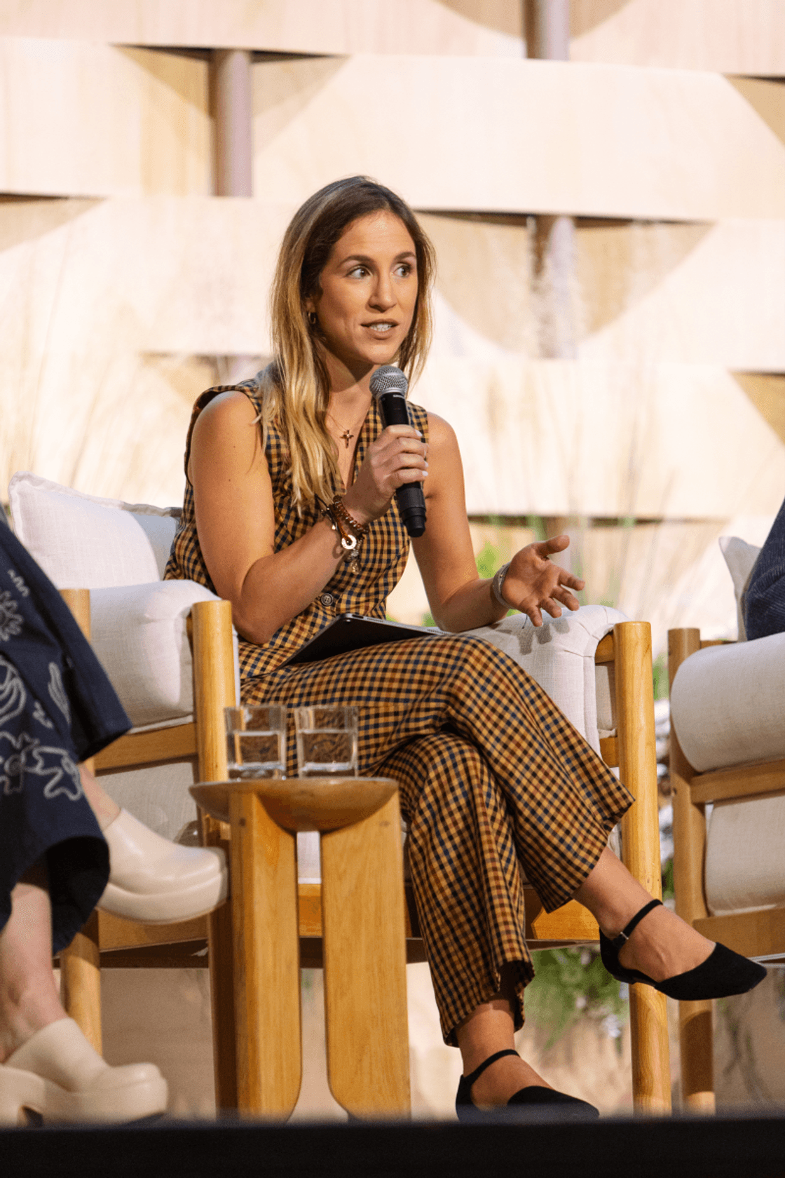 Ana Rodes talking at the Textile Exchange Conference 2024 for Recover