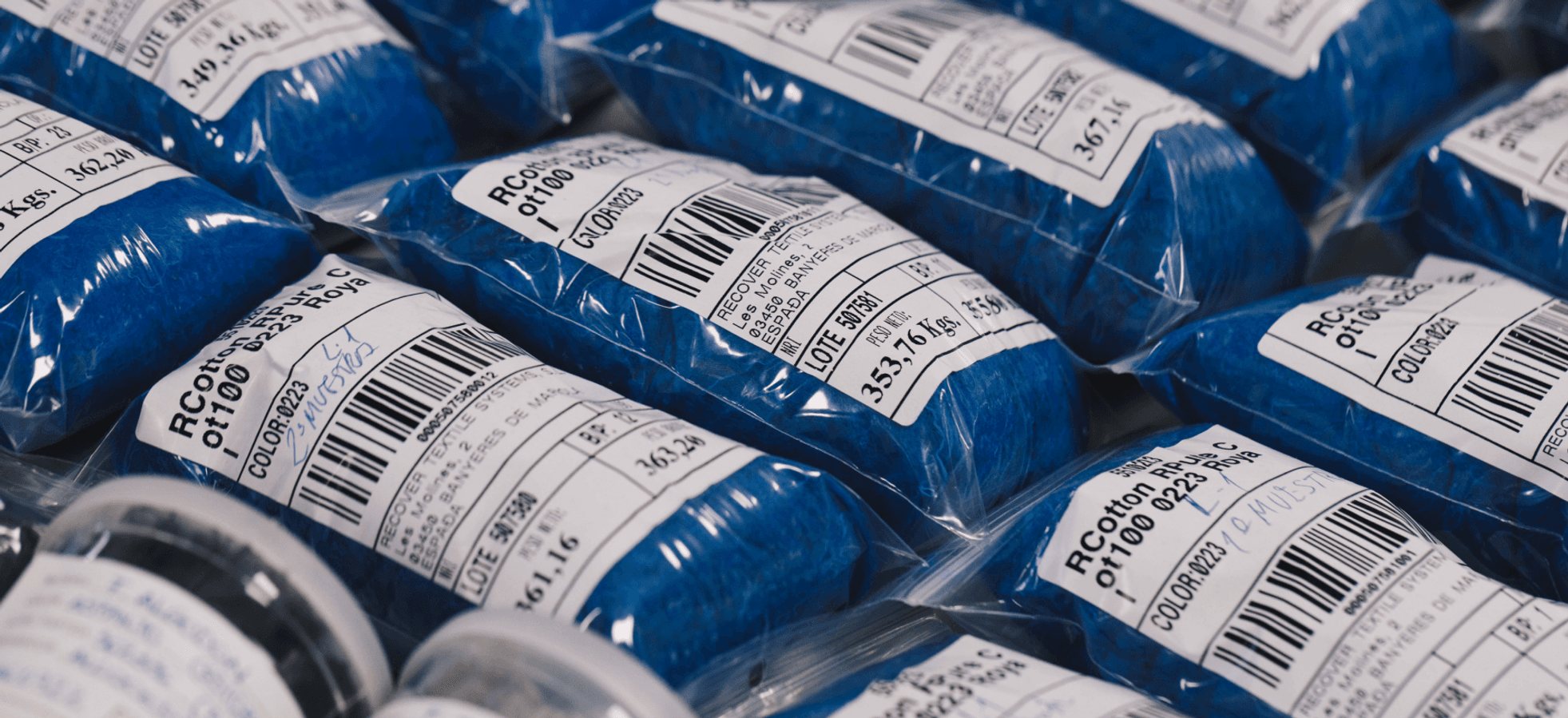 Recover sample bales of recycled cotton fiber going through our testing services and quality check