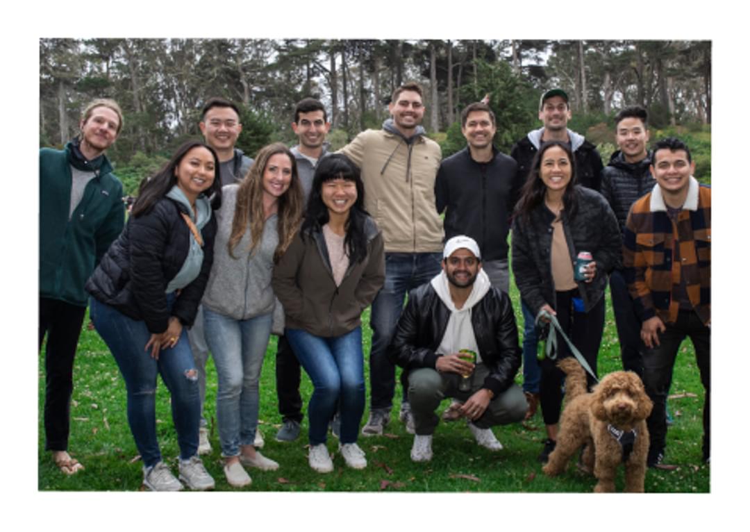 Sprig employees in a park