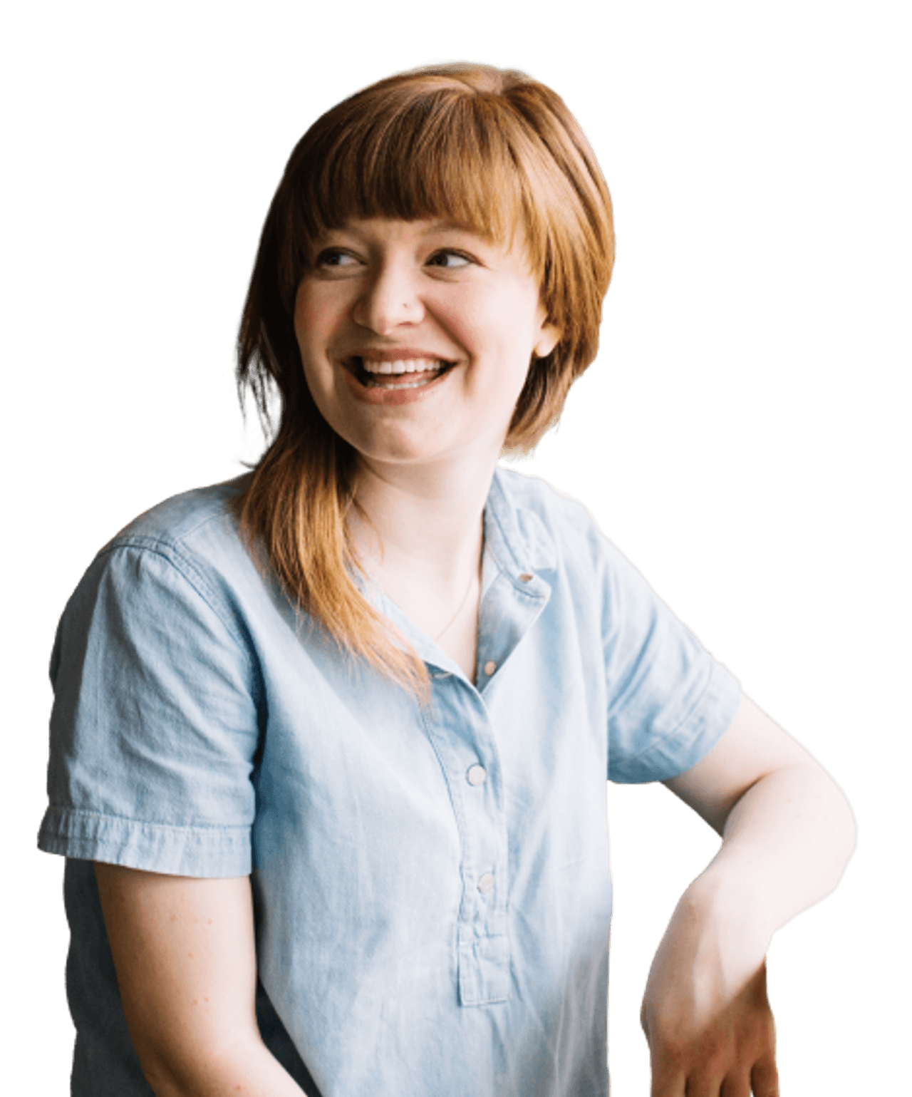Woman smiling and looking over her shoulder