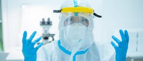 Depositphotos 360345968 stock photo doctor woman wear isolation gown