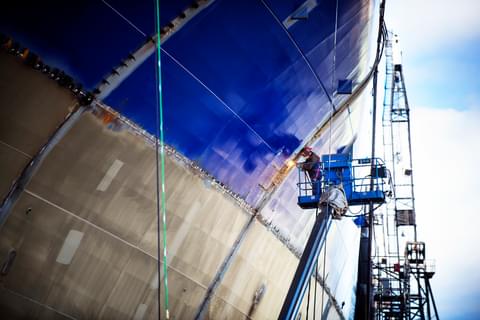 Low angle view of worker welding ship at industry 2022 02 04 04 19 42 utc