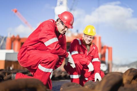 Workers on oil rig examining chains 2021 11 16 20 31 33 utc